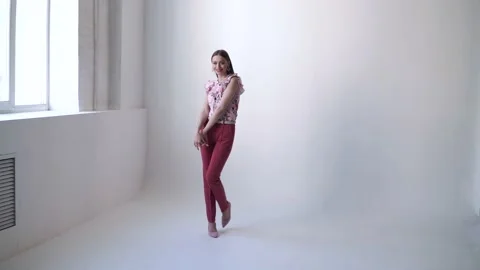 Sexy girl on a white background posing and smiling, glamorous girl, fashion Stock Footage 137084875