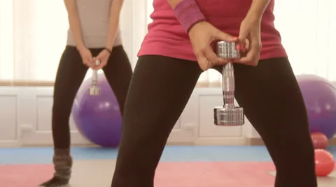 Sexy girls working out in modern gym club . Stock Footage