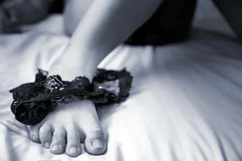 Sexy laced pattern underware on leg Stock Photos