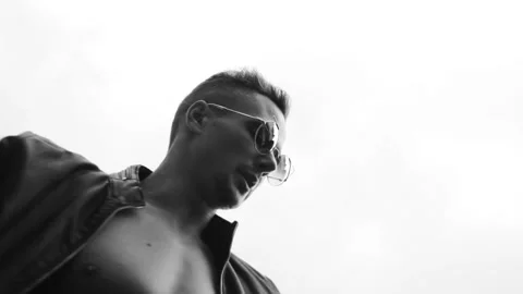 Sexy man dance in sunglasses Stock Footage 95611953