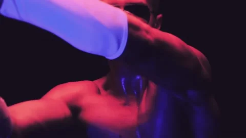 Sexy man is dancing and closes the screen with his hand Stock Footage 93554385