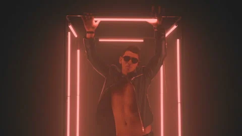 Sexy man dancing in light cube Stock Footage 133415637