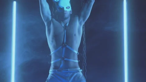 Sexy man dancing in a rabbit mask Stock Footage 145860122
