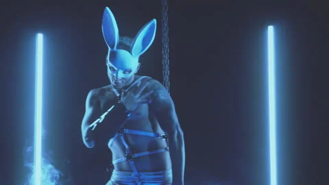 Sexy man dancing in a rabbit mask Stock Footage 145995927