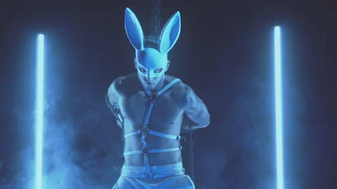 Sexy man dancing in a rabbit mask Stock Footage 145995951