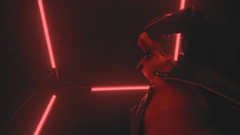 Sexy man dancing in red light Stock Footage 133205047