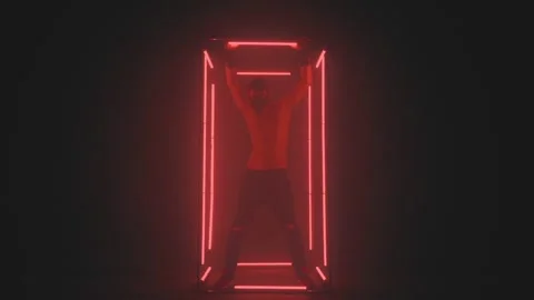 Sexy man in mask dancing in red light Stock Footage 133206098
