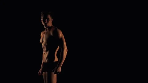 Sexy man posing on black background Video stock 99614419