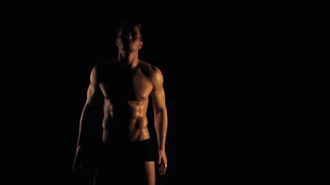Sexy man posing on black background Video stock 99614570