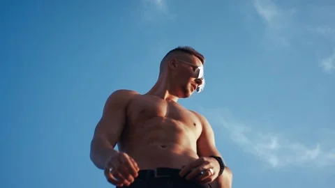 Sexy man in sky Stock Footage 95034426