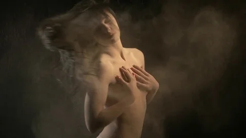 Sexy model in studio posing with paints holi Stock Footage 81633362