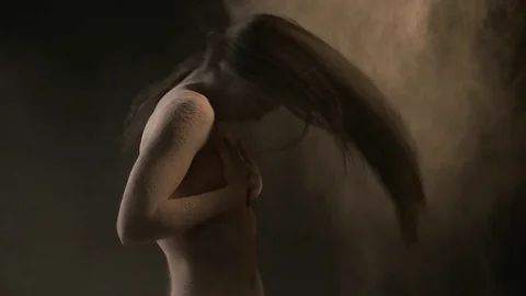 Sexy model in studio posing with paints holi Stock Footage 81633745