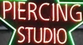 Sexy Pierced Tattoo Salon Body Piercing Studio Neon Sign Light Outdoor Signage HD Footage
