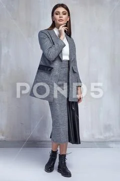 Sexy pretty fashion woman wear wool skirt jacket casual trend clothes collect Stock Photos