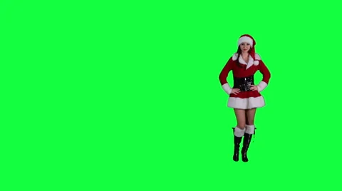 Sexy Santa's helper demonstrates an object chroma key (green screen) Stock Footage 54683522
