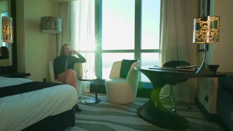Sexy secretary drinks wine with boss, director at home or office. Beautiful Stock Footage