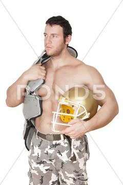 Sexy shirtless american football player. Stock Photos