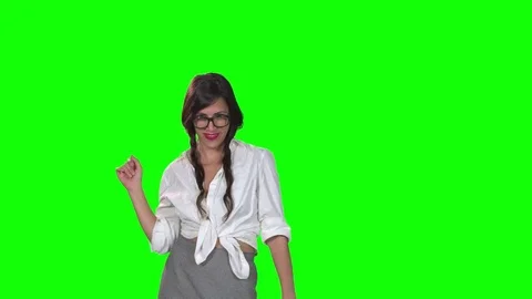 Sexy student dancing on green screen Vidéo 79034983