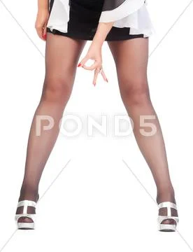 Sexy stylish legs in black sheer stockings Stock Photos