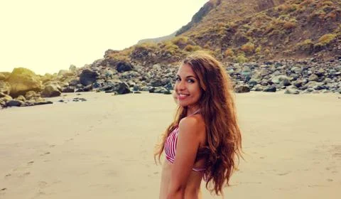 Sexy tanned bikini woman on Playa de Benijo, Tenerife Stock Photos