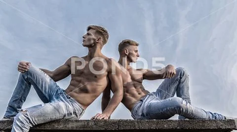 Sexy torso attractive body. Denim pants emphasize masculinity sexuality. Men Stock Photos