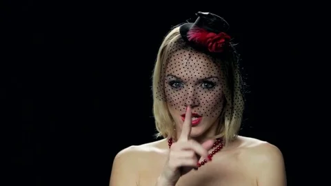 Sexy widow gesturing on black background. Stock Footage 82636844