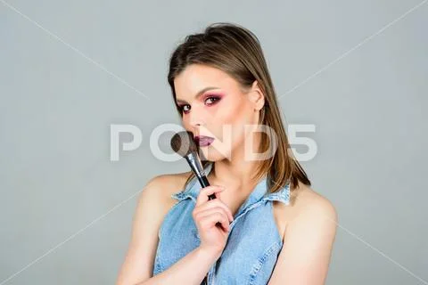 Sexy woman with professional make up brush. sexuality. skincare cosmetics Stock Photos