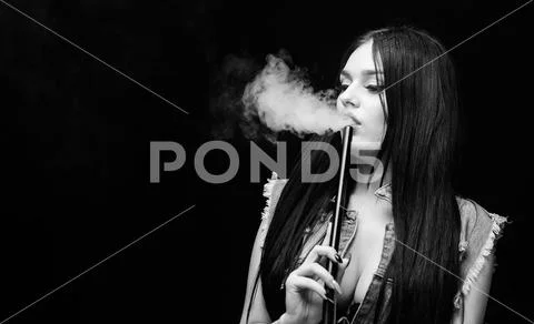 Sexy woman smoking cigar. Bad habit. Woman vapor. unhealthy addiction. Tabacco Stock Photos