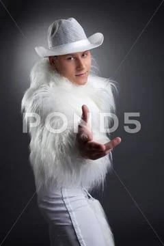 Sexy young dancer in white fur costume Stock Photos