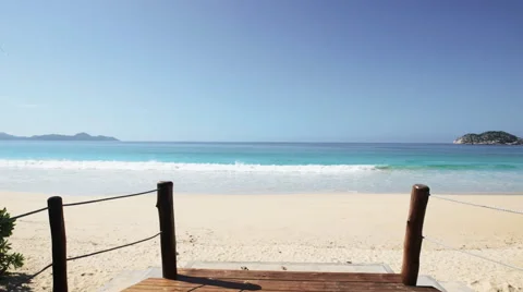 Seychelles beach with blue ocean view. Camera flying Stock Footage 59847242