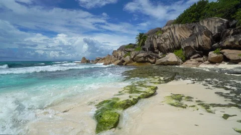 Seychelles beach with ocean waves Stock Footage 129405393