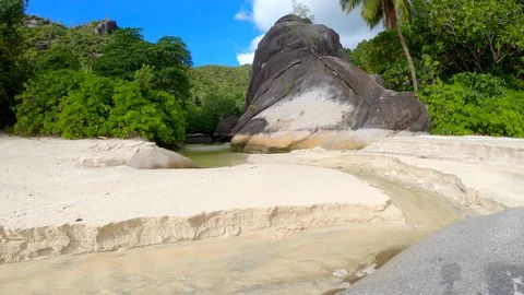 Seychelles beach stream Stock Footage 129408224