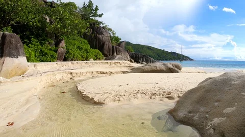 Seychelles beach stream Stock Footage 129408379