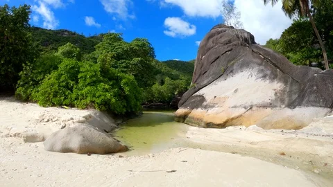 Seychelles beach stream Stock Footage 129408568