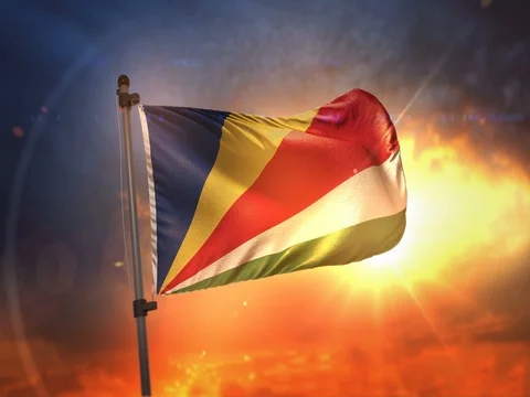 Seychelles Flag Backlit At Beautiful Sunrise Loop Slow Motion 4K Stock Footage 76814558
