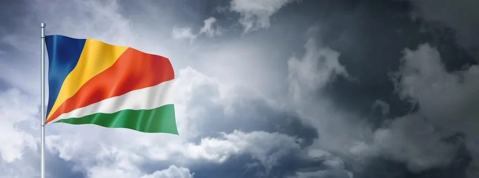 Seychelles flag on a cloudy sky Stock Illustration