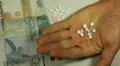 Seychellois Rupee SCR, Counting Drugs and Money, Health Care, Colorful Pills HD Footage