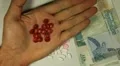 Seychellois Rupee SCR, Counting Drugs and Money, Health Care, Colorful Pills HD Footage