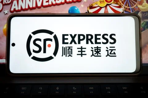 Sf express logo displaying on a mobile device Stock Photos
