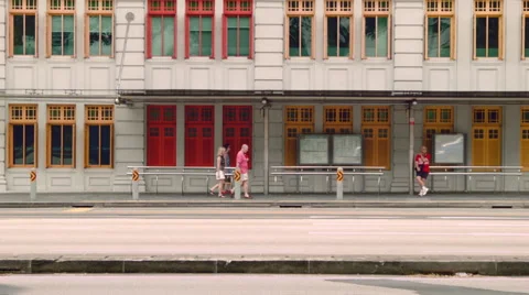 SG Man waiting at bus stop Stock Footage 46951421
