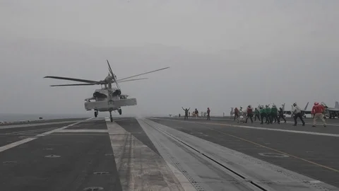 SH-60 Sea Hawk taking off from USS John C Stennis Stock Footage 101373908