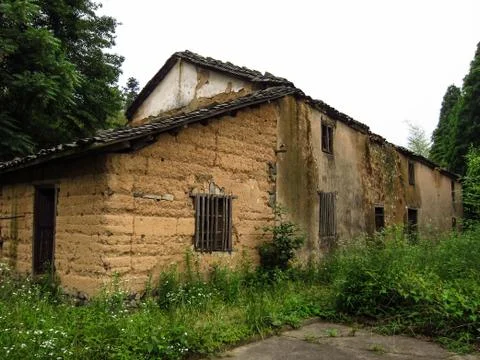 Shabby and Old-fashioned House in Mountain Area Stock Photos