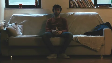 Shabby Boy on Sofa Stock Footage 87204156