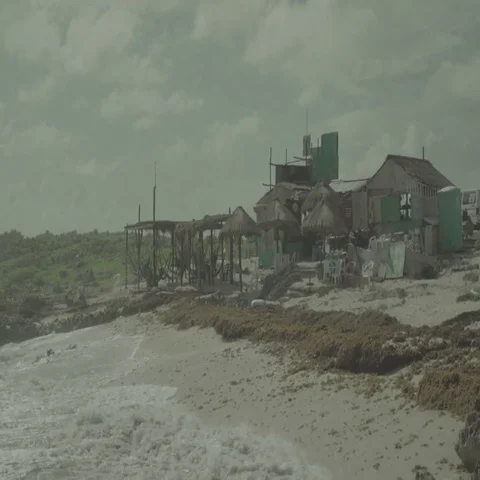 Shack on Tropical Beach During Storm Stock Footage 69652332