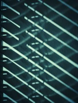 Shade of blinds on the wall Stock Photos