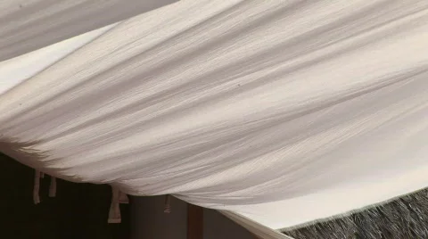 Shade curtains blowing in the wind Stock Footage 574624