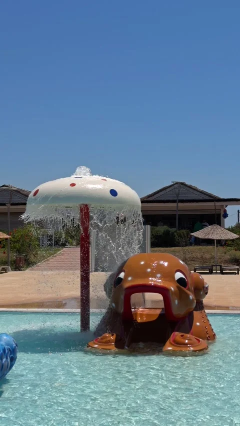 Shade Umbrella Over Splash Pool at an Aqua Park in Cesme Stock Footage 339710777