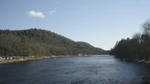 Shades of blue complement low green hills Stock Footage 166484287