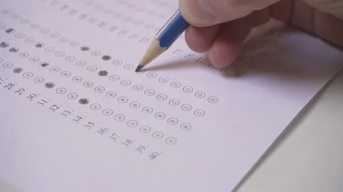 Shading Answers To Multiple Choice Test Questions - close up Stock Footage 176960516