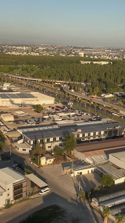 Shadow of about to landing plane over the fields on a city Stock Footage 337222212